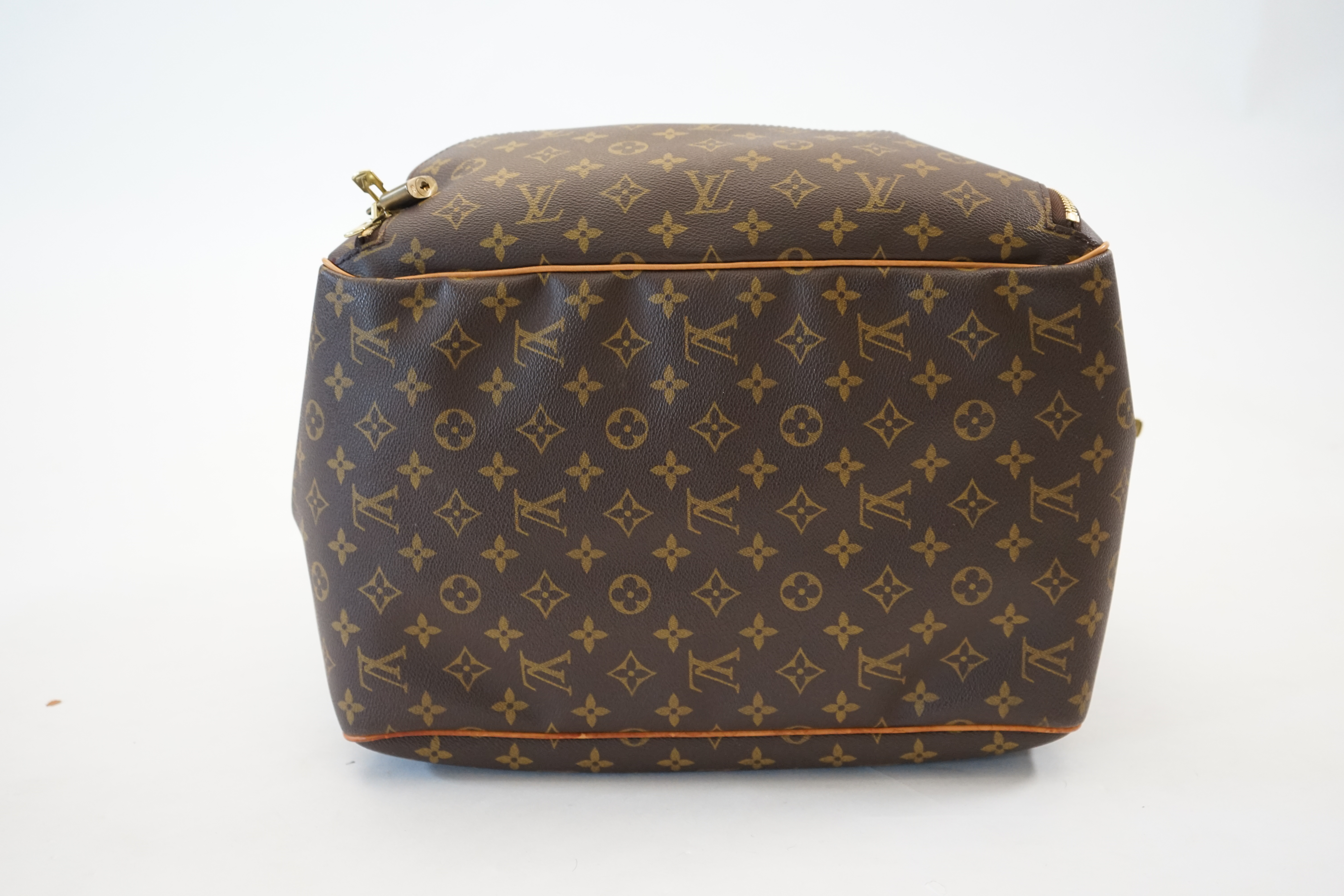 A Louis Vuitton Evasion travel bag width 38cm, depth 23cm, length 33cm, hand drop 12cm